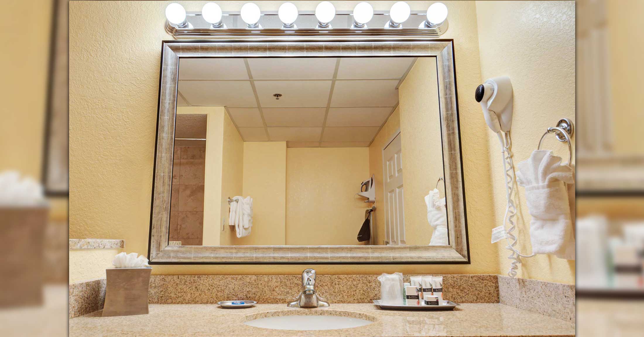 mirror and vanity in one king bed suite, please note there is a limited quantity of suites