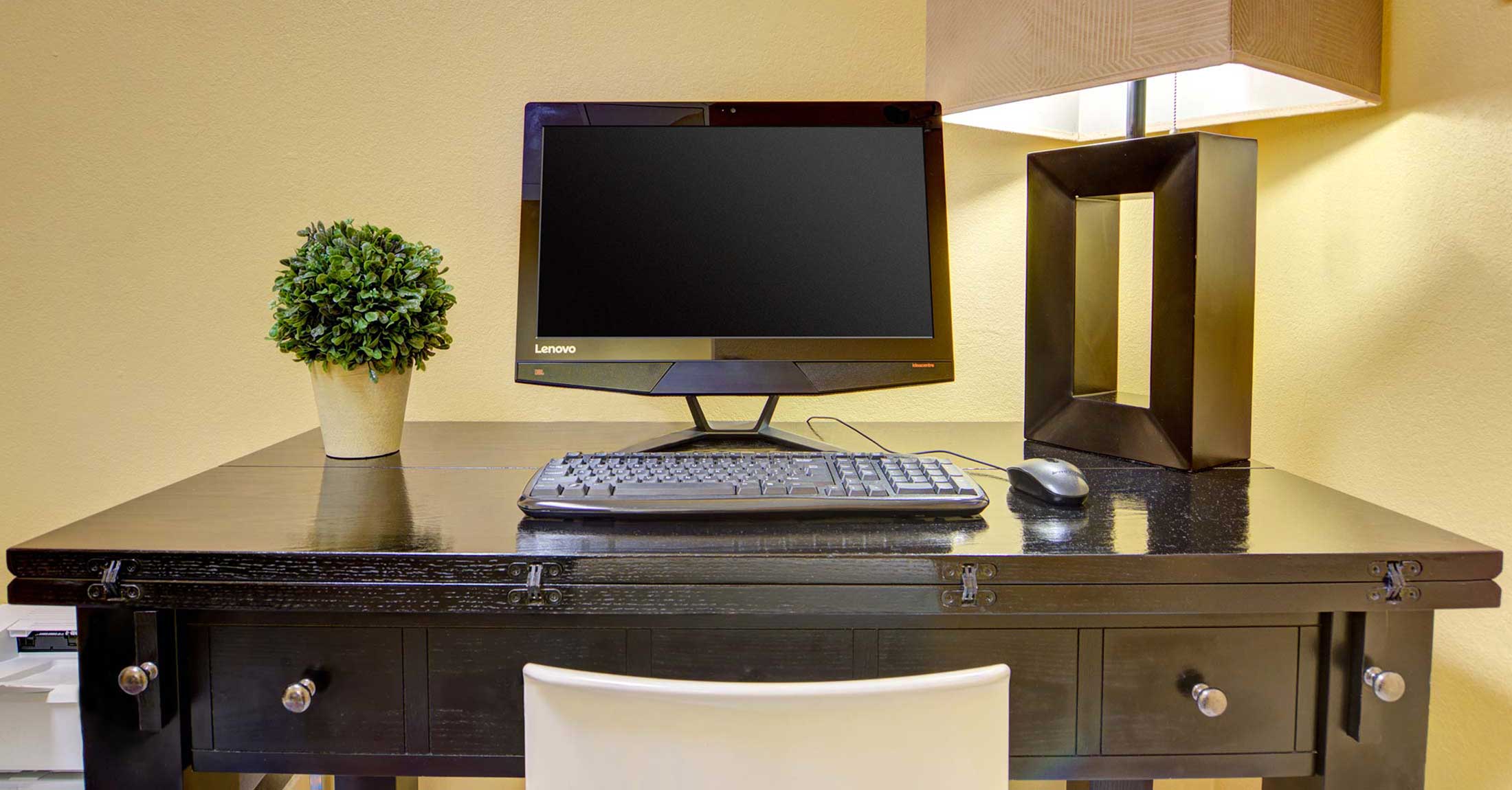 closeup of computer work station in business center