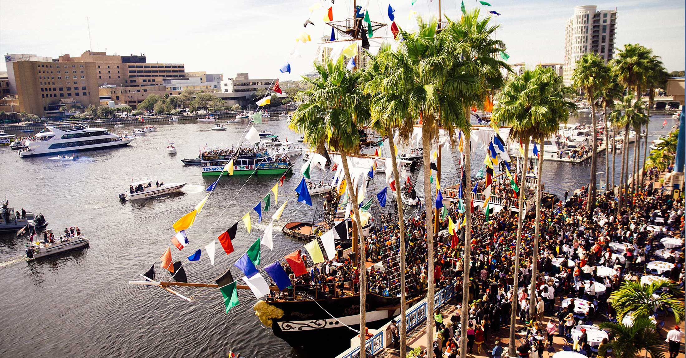 pirate ship in bay at gasparilla pirate festival in front of the tampa convention center