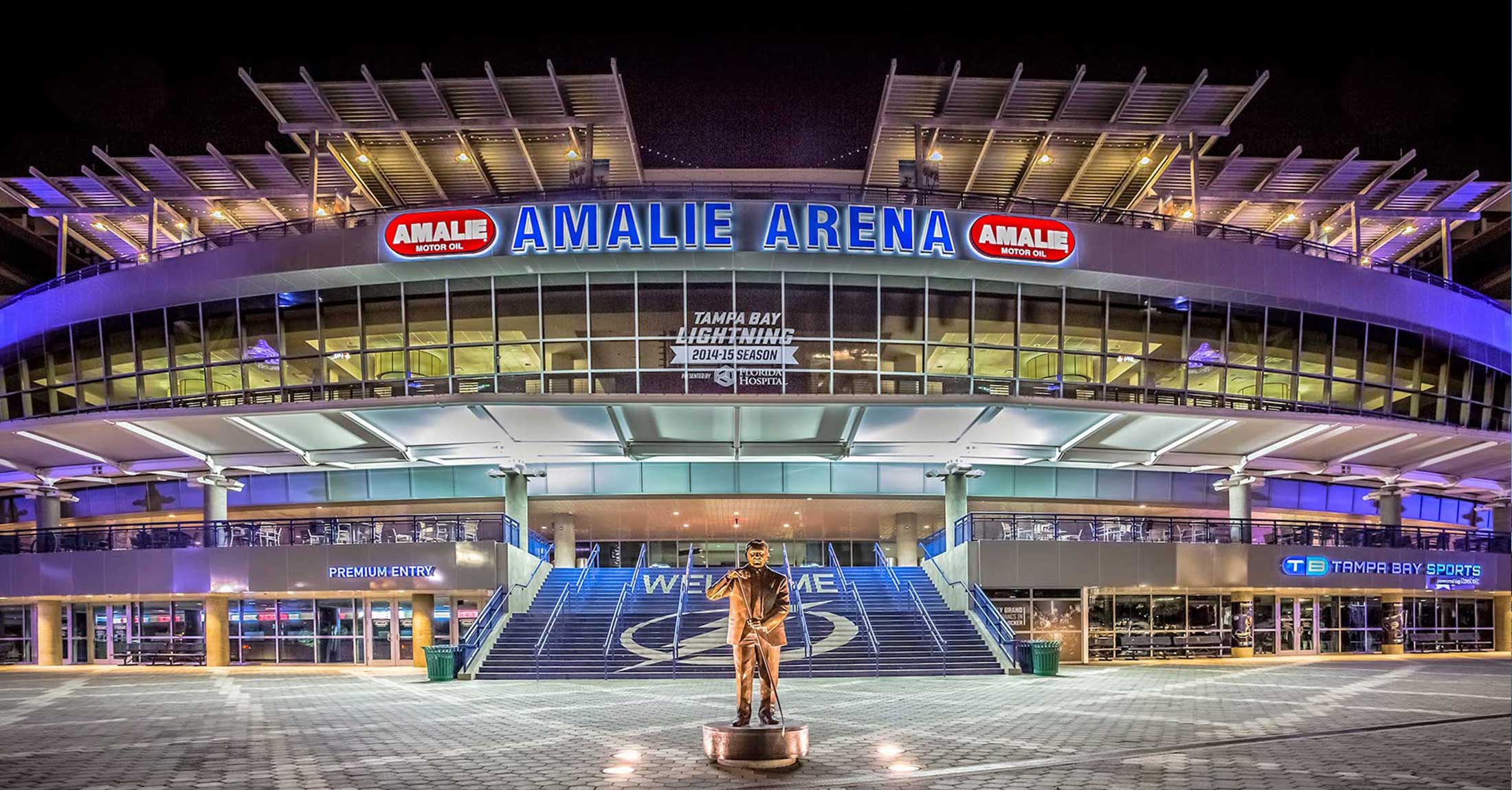 main entrance of amalie arena at night