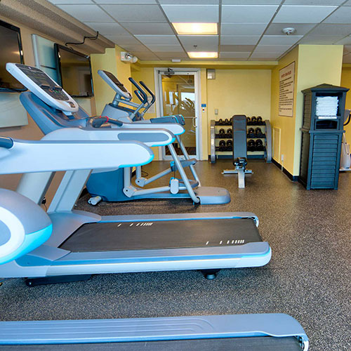 24-Hour Fitness Center Treadmills and Free Weights